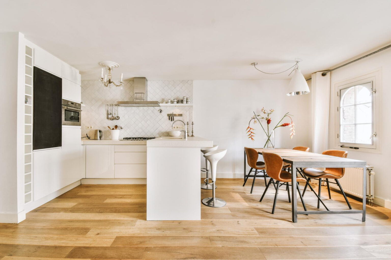 spacious-attic-room-with-sofa-kitchen